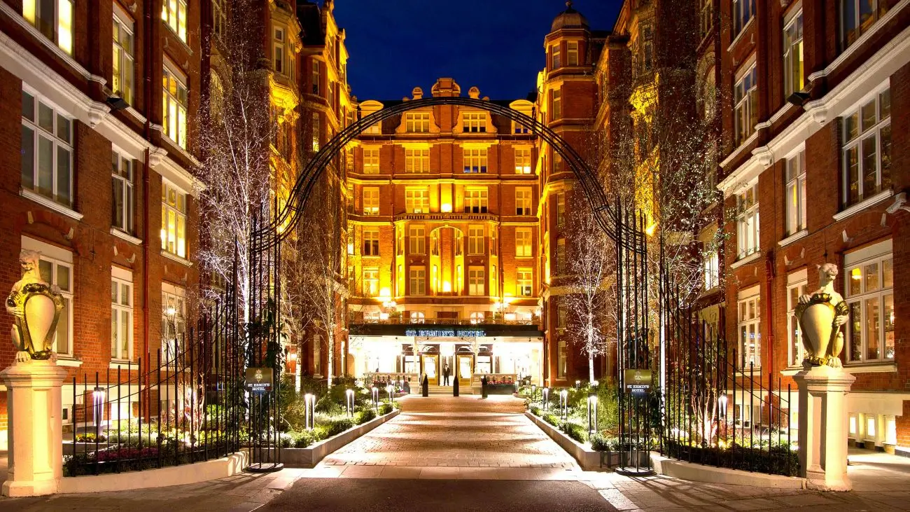St. Ermin's , Autograph Collection exterior courtyard entrance at night with dramatic gates and uplighting